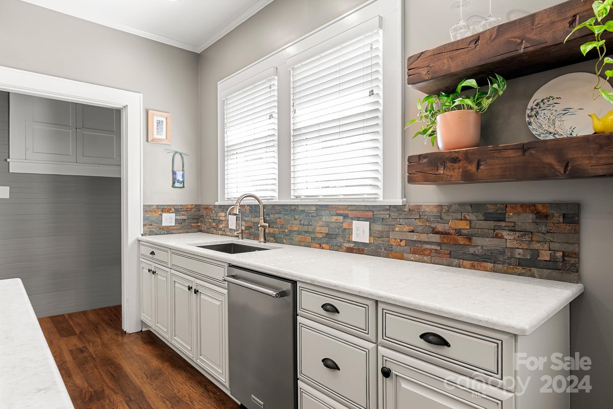 221 Ridgeway Avenue Statesville, NC 28677 - Photo 18 of 45 a kitchen with a sink and a window