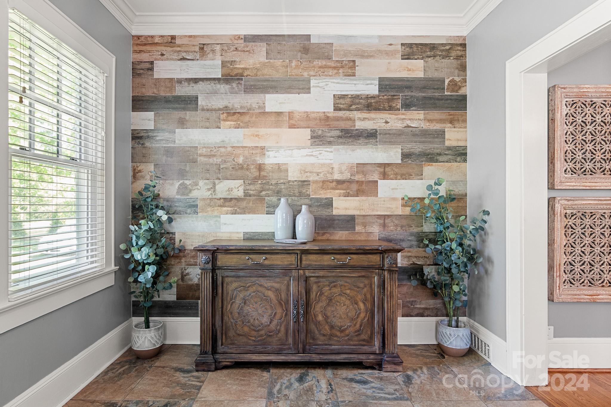 221 Ridgeway Avenue Statesville, NC 28677 - Photo 2 of 45 a closeup of a stove with a potted plant