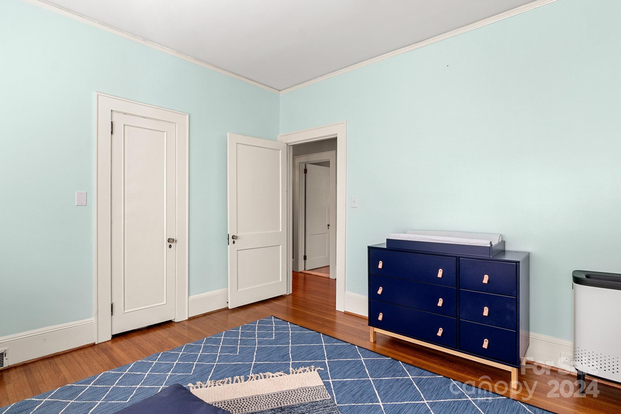 221 Ridgeway Avenue Statesville, NC 28677 - Photo 23 of 45 a room with a rug and a dresser
