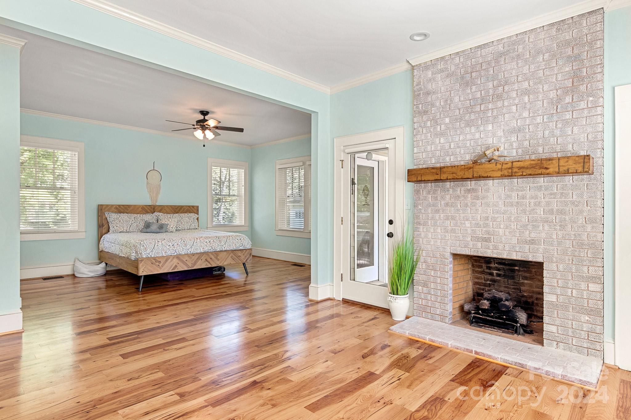 221 Ridgeway Avenue Statesville, NC 28677 - Photo 26 of 45 a living room with furniture and a fireplace