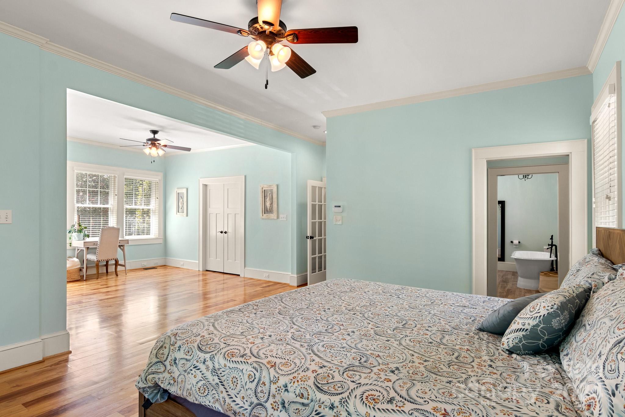 221 Ridgeway Avenue Statesville, NC 28677 - Photo 29 of 45 a bedroom with a bed chandelier and a window