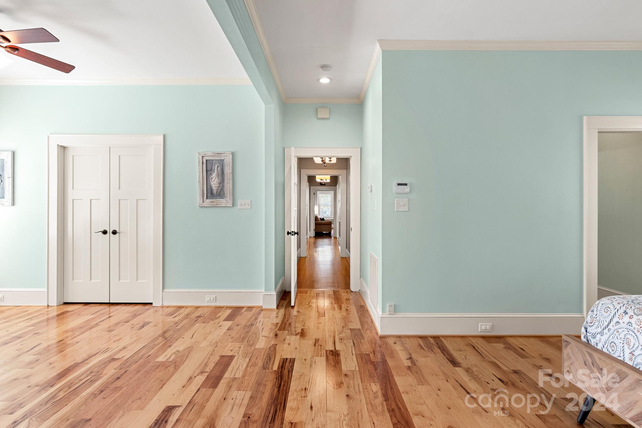 221 Ridgeway Avenue Statesville, NC 28677 - Photo 31 of 45 a view of a bedroom with wooden floor and bedroom