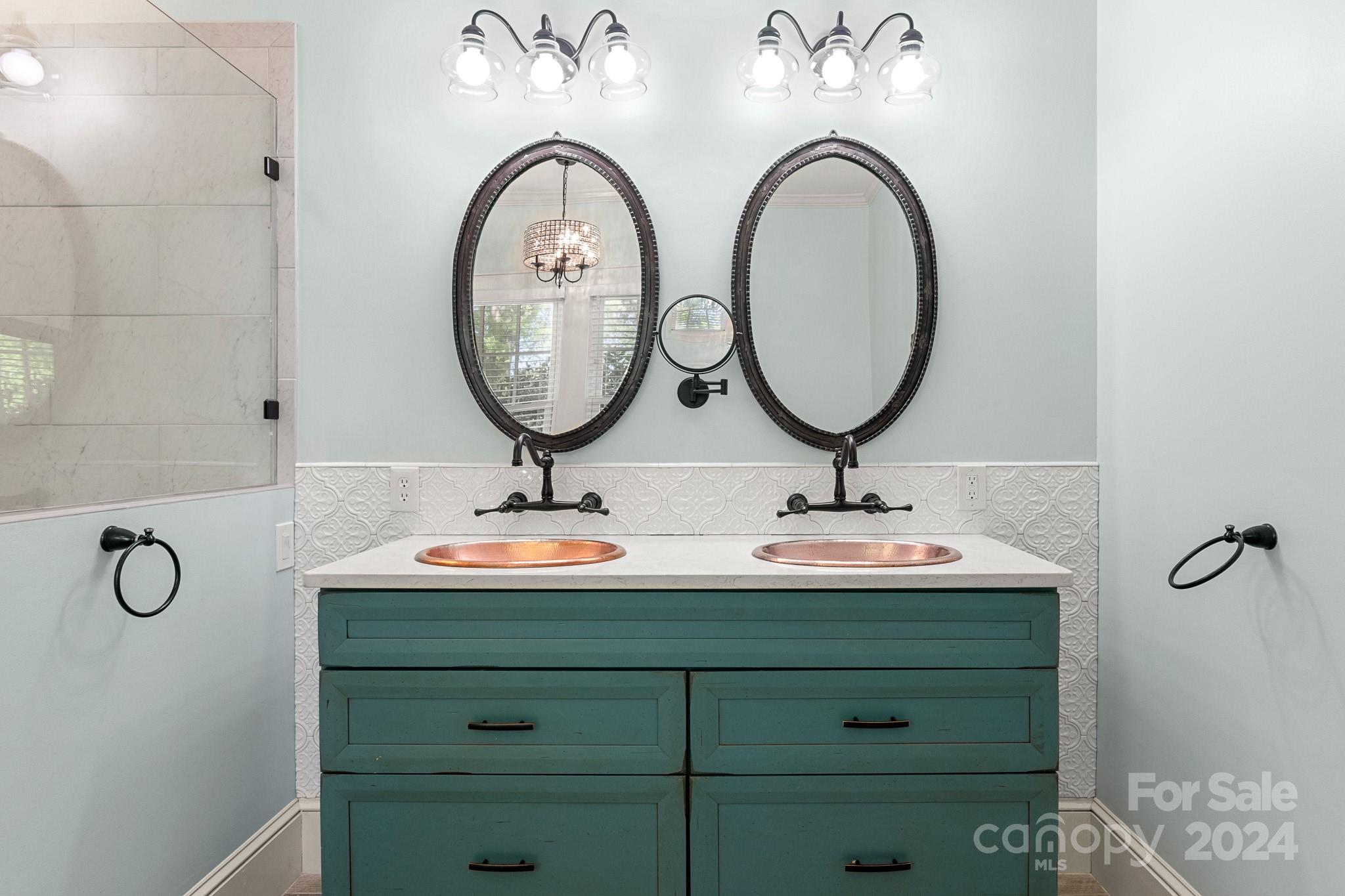 221 Ridgeway Avenue Statesville, NC 28677 - Photo 33 of 45 a bathroom with a sink and a mirror