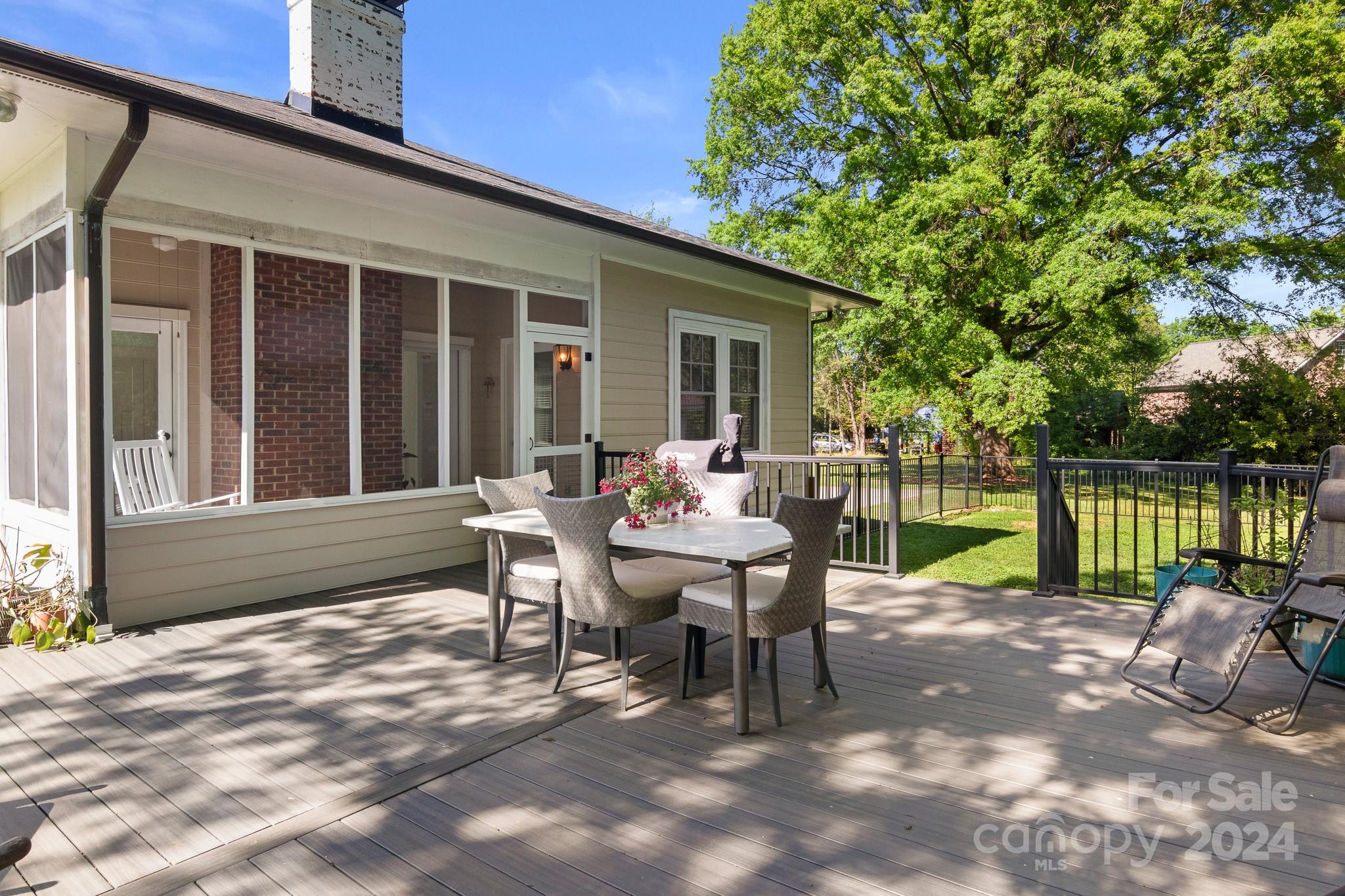 221 Ridgeway Avenue Statesville, NC 28677 - Photo 36 of 45 a view of a house with backyard sitting area and garden