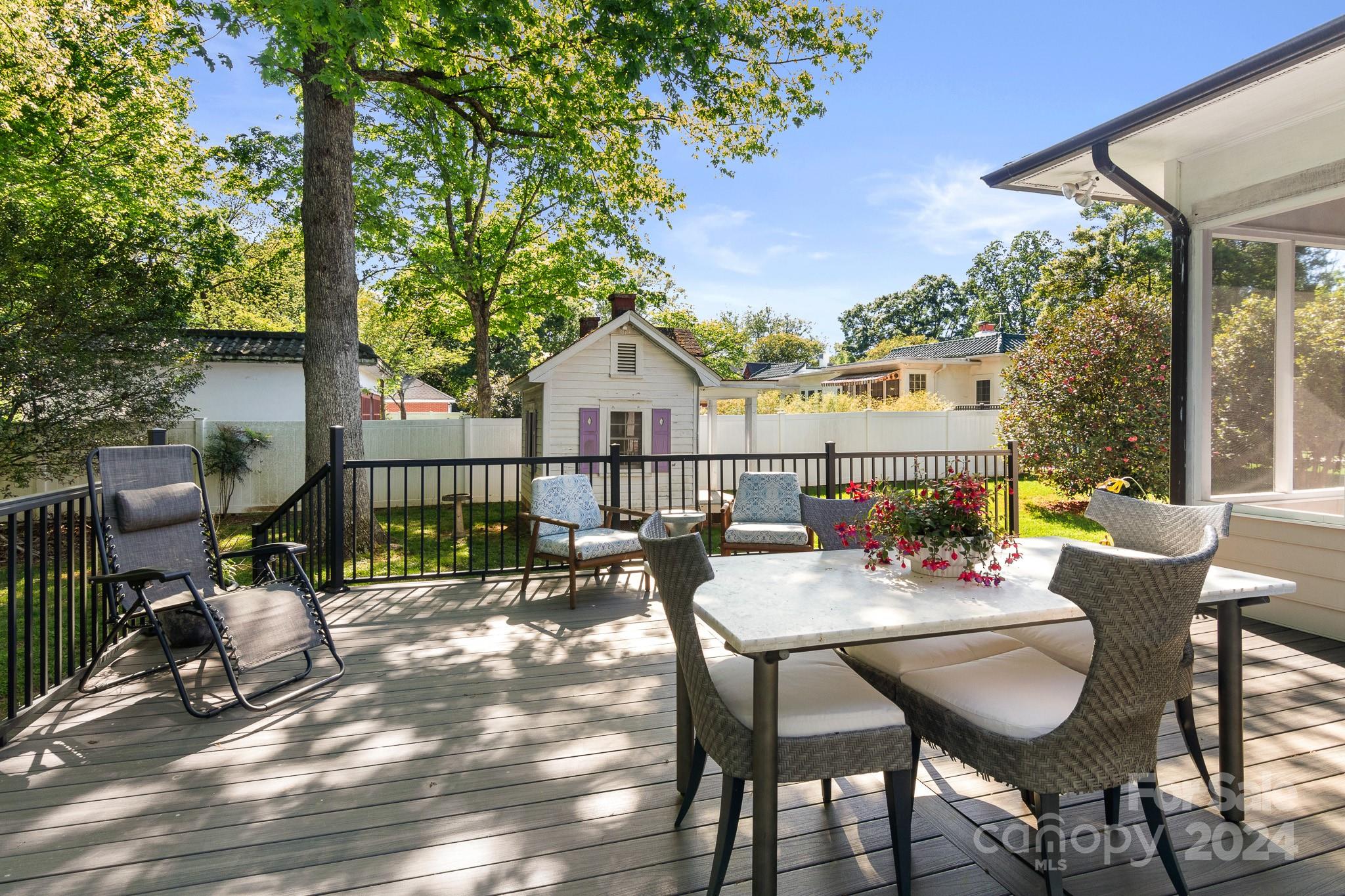 221 Ridgeway Avenue Statesville, NC 28677 - Photo 37 of 45 a view of a chairs and table in the patio