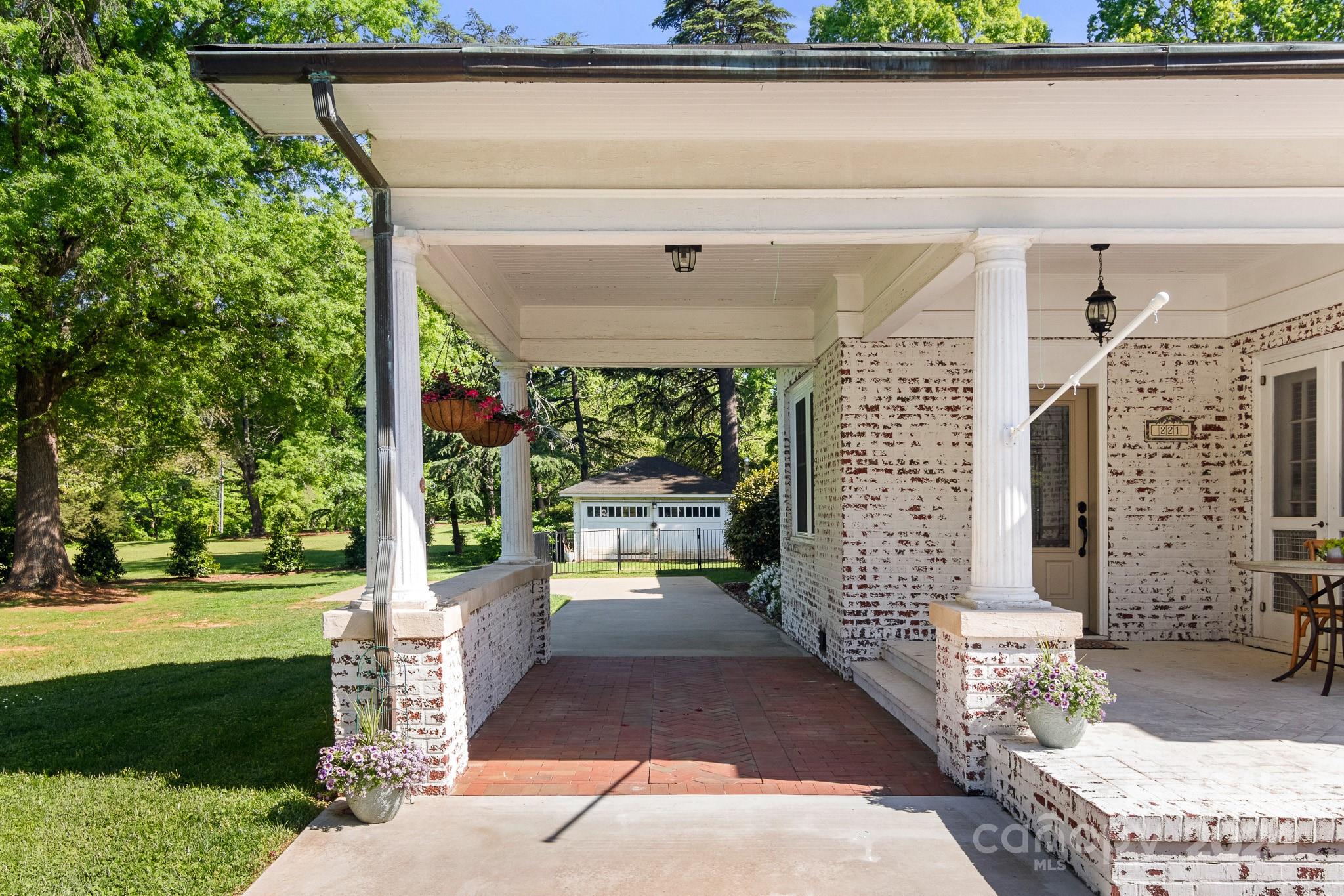 221 Ridgeway Avenue Statesville, NC 28677 - Photo 41 of 45 a front view of a house with a yard