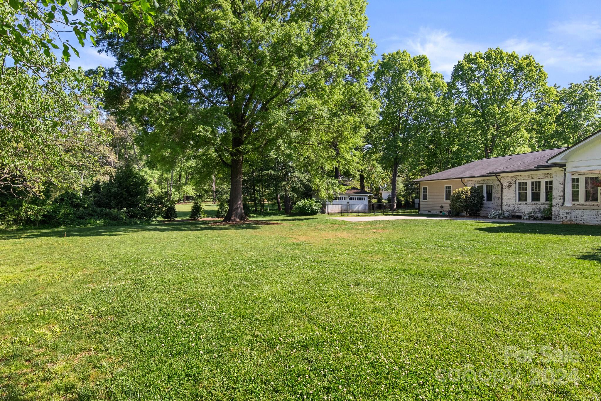 221 Ridgeway Avenue Statesville, NC 28677 - Photo 44 of 45 a view of house with a yard