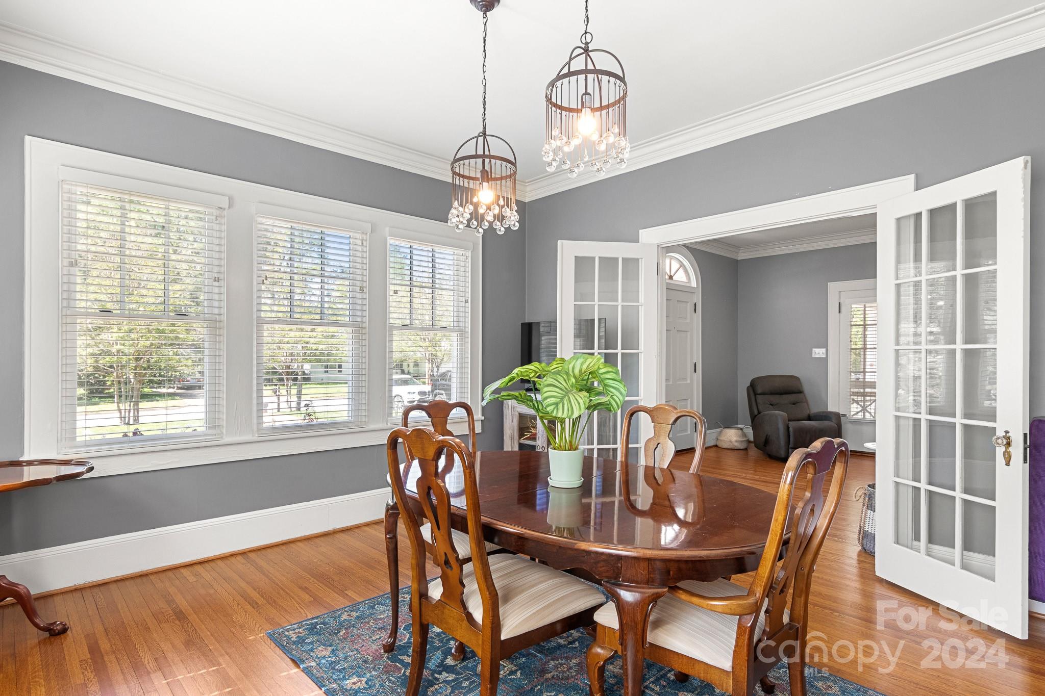 221 Ridgeway Avenue Statesville, NC 28677 - Photo 9 of 45 a view of a dining room with furniture window and outside view