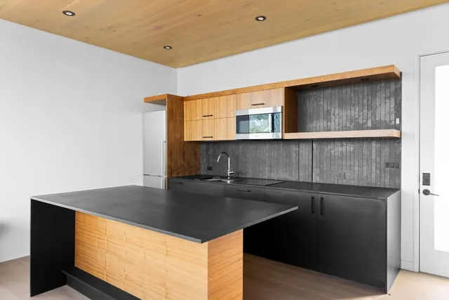 a balcony view with a couch and city view