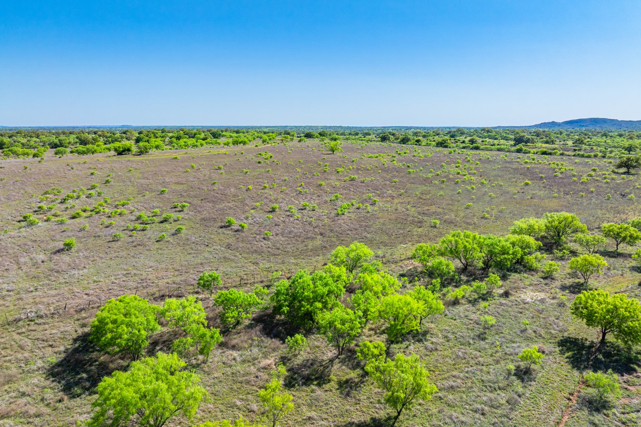 5230 County Road 409 Llano, TX 78643 - Photo 19 of 21 a view of a lake with a beach