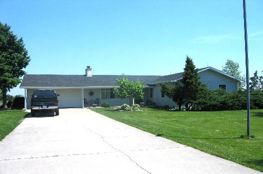 30353 South Klemme Road Beecher, IL 60401 - Photo 1 of 1 a front view of house with yard and green space