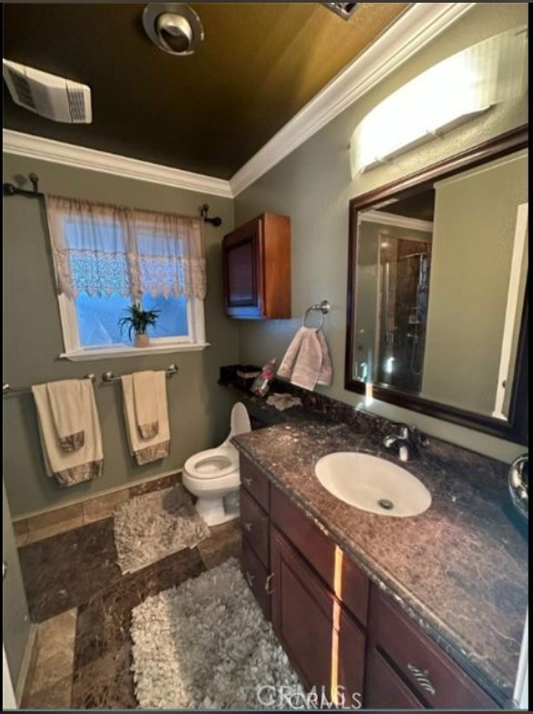 48 Jeanette Way Watsonville, CA 95076 - Photo 8 of 14 a bathroom with a granite countertop sink and a mirror
