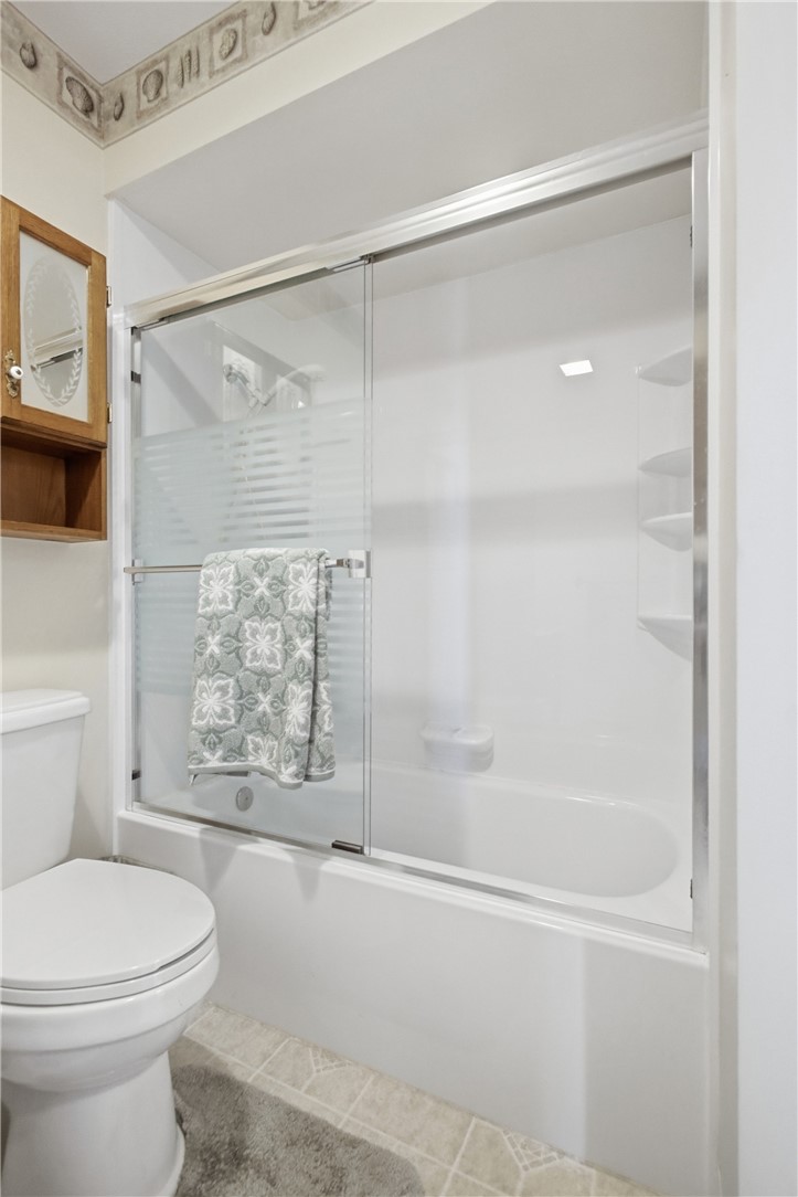 6718 Old Columbus Road South Vienna, OH 45369 - Photo 25 of 33 This bathroom features a sleek glass shower enclosure and a convenient soaking???????????????????????? tub.