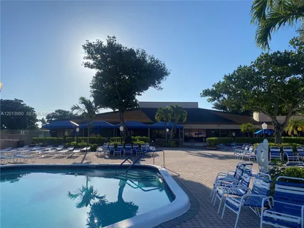 a view of an outdoor space with swimming pool