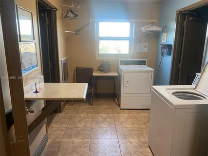 a empty room with a wooden closet