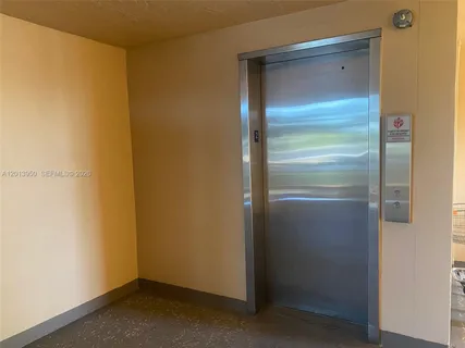 a bathroom with a shower and a shower curtain