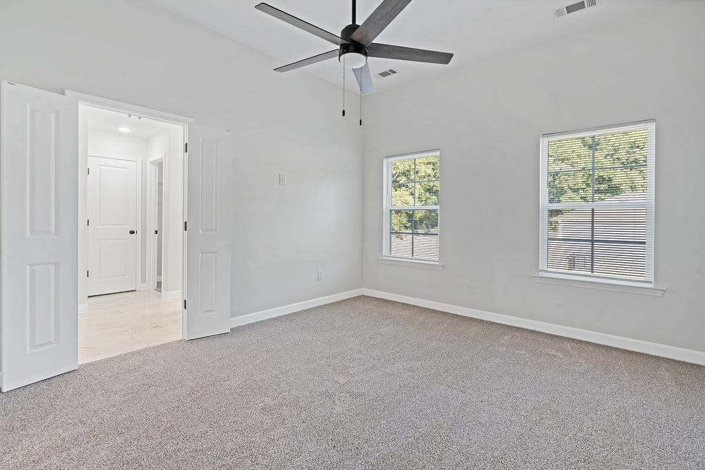 372 Edith Avenue Memphis, TN 38126 - Photo 15 of 23 Unfurnished room featuring light colored carpet and a ceiling fan