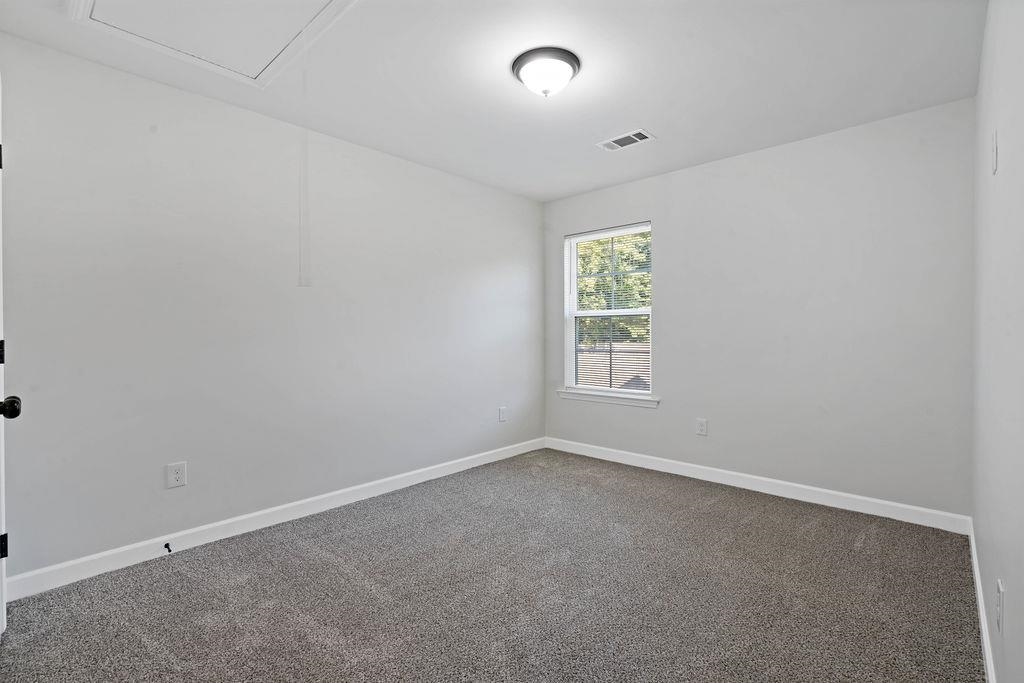 372 Edith Avenue Memphis, TN 38126 - Photo 9 of 23 Spare room featuring carpet floors and baseboards