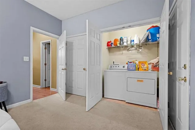 an aerial view of a house with swimming pool patio and outdoor seating