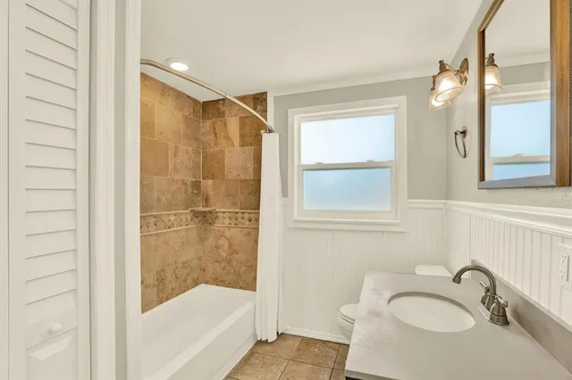 a bathroom with a sink and a bathtub