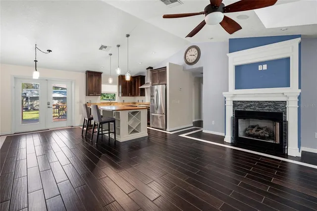 a view of a backyard with sitting area and furniture