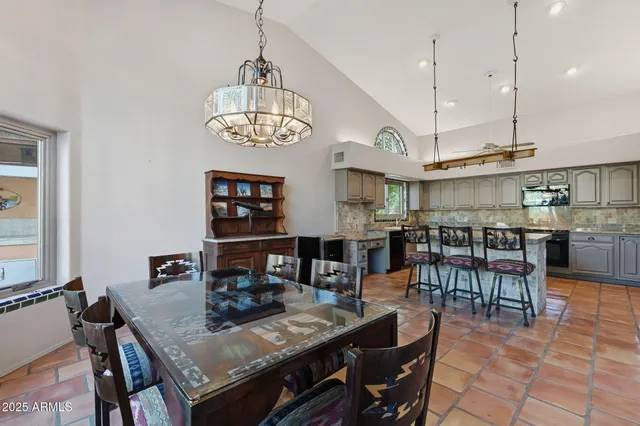 a spacious bathroom with a double vanity sink a large mirror and bathtub