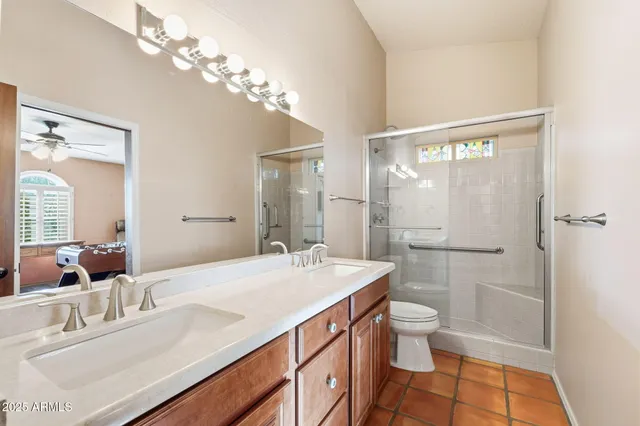 a view of a swimming pool with outdoor seating