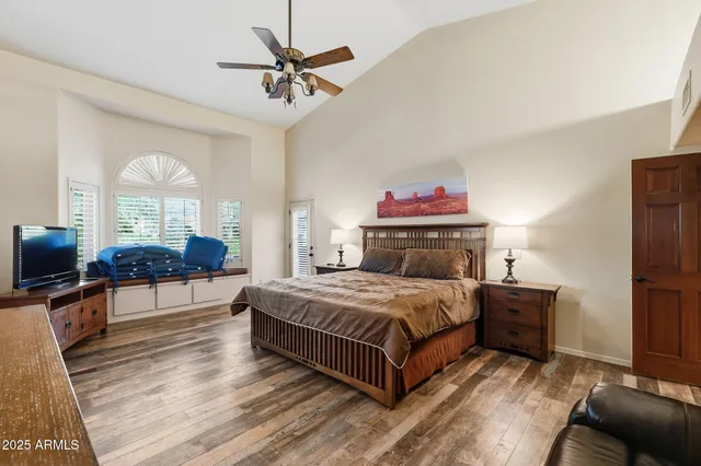 a view of a garden with a building in the background