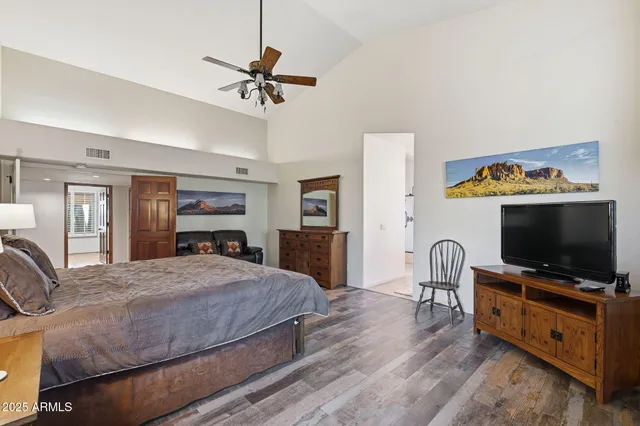 a backyard of a house with a garden and barbeque oven