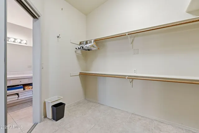 an aerial view of residential building with green space