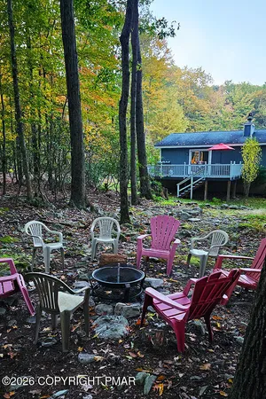 a view of a sitting area with furniture and garden