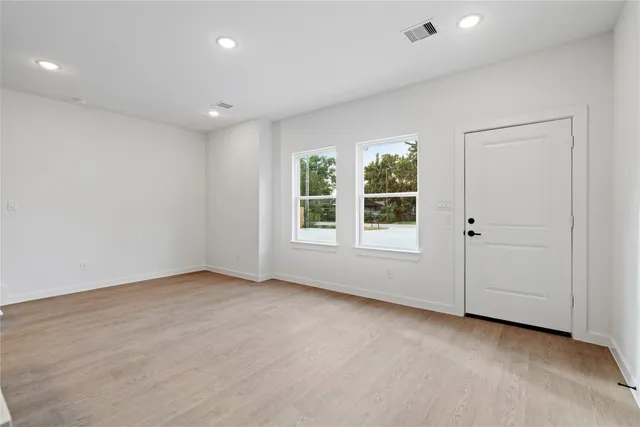 an empty room with windows