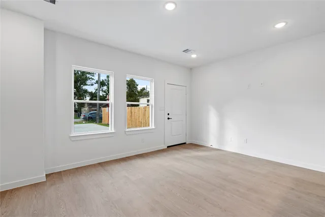 an empty room with windows