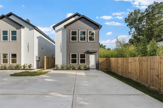 front view of a house with a street