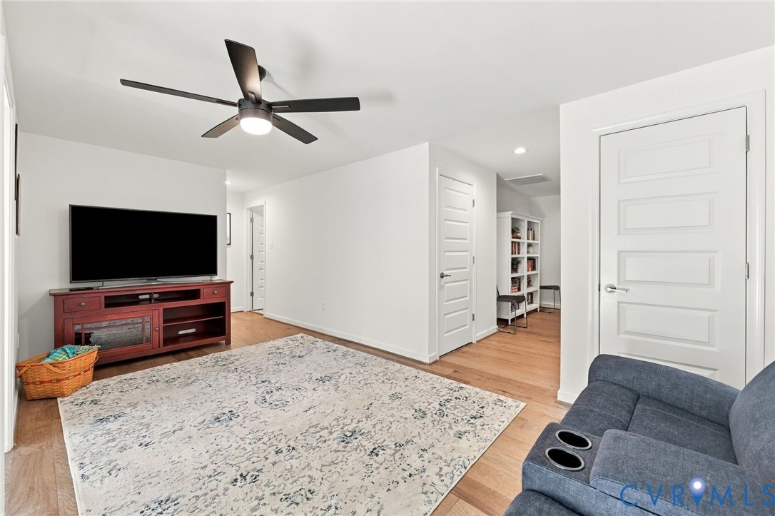 12824 Deep Wl Road Midlothian, VA 23112 - Photo 30 of 42 Wood-finish flooring, recessed lighting, and a mod