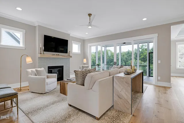 a kitchen with granite countertop a table and chairs in it
