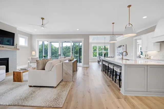 a kitchen with white cabinets and a sink