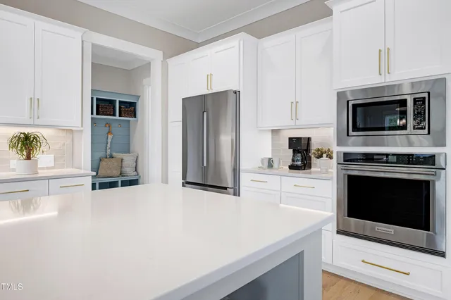 a bathroom with a tub a sink and a shower