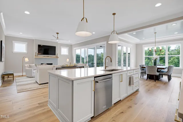 a bathroom with a toilet a sink a shower and mirror