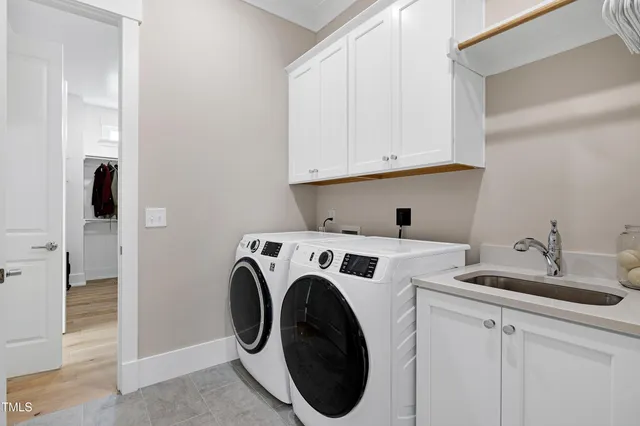 a view of a livingroom with hardwood and furniture