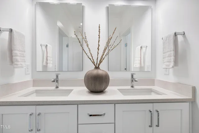 an aerial view of a house with garden space and street view