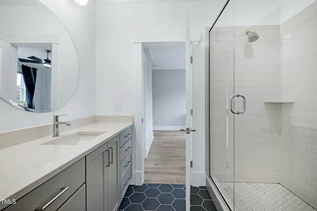 a view of a swimming pool with outdoor seating