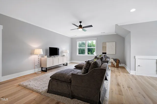 an aerial view of a house with a garden