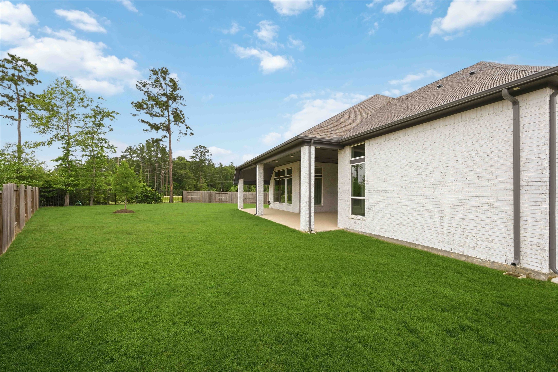 17564 Watercolor Way Conroe, TX 77302 - Photo 39 of 42 Situated on one of the largest lots in the community with space for a pool, play, gardening or whatever your heart desires!
