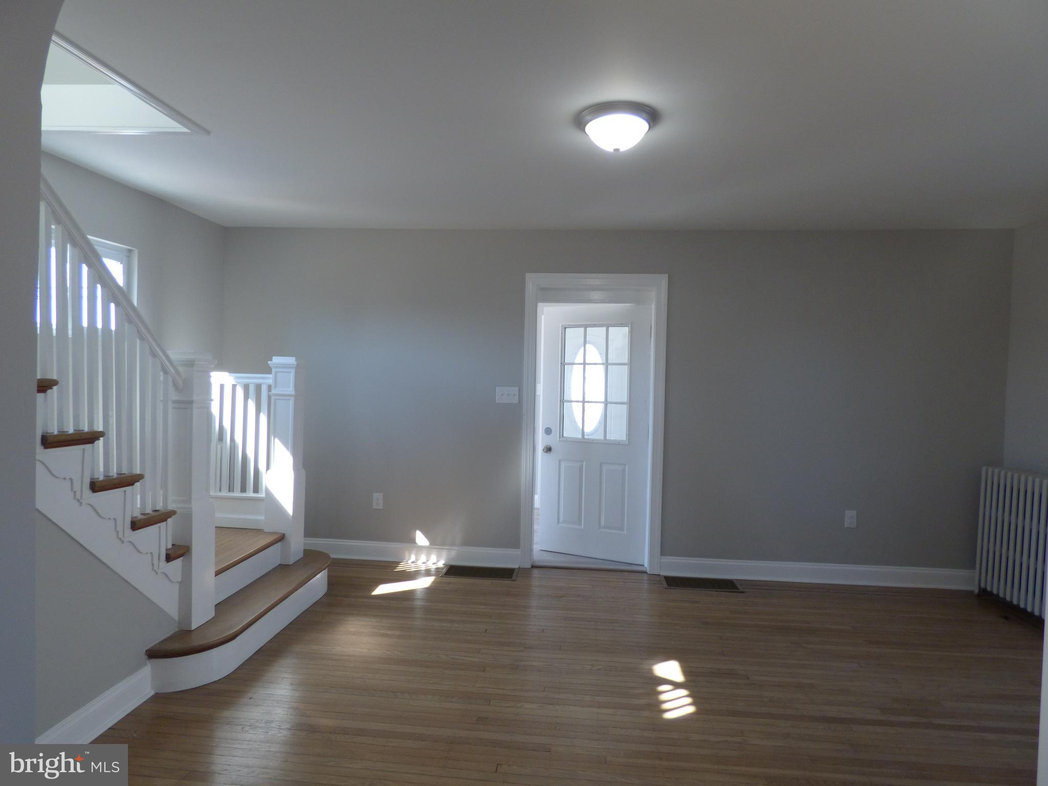 726 Newportville Road Croydon, PA 19021 - Photo 14 of 30 a view of empty room with wooden floor
