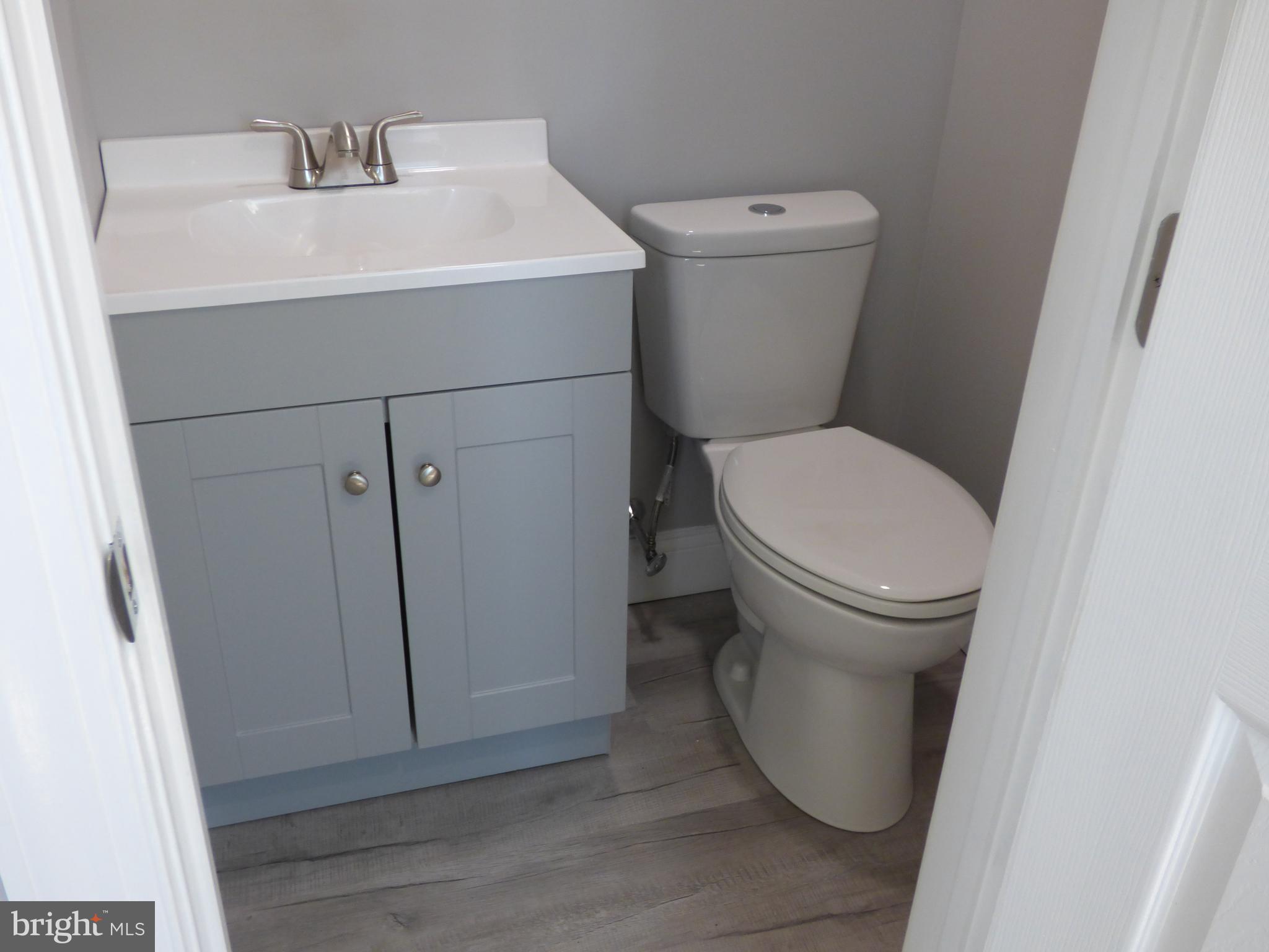 726 Newportville Road Croydon, PA 19021 - Photo 19 of 30 a white toilet sitting next to a white sink