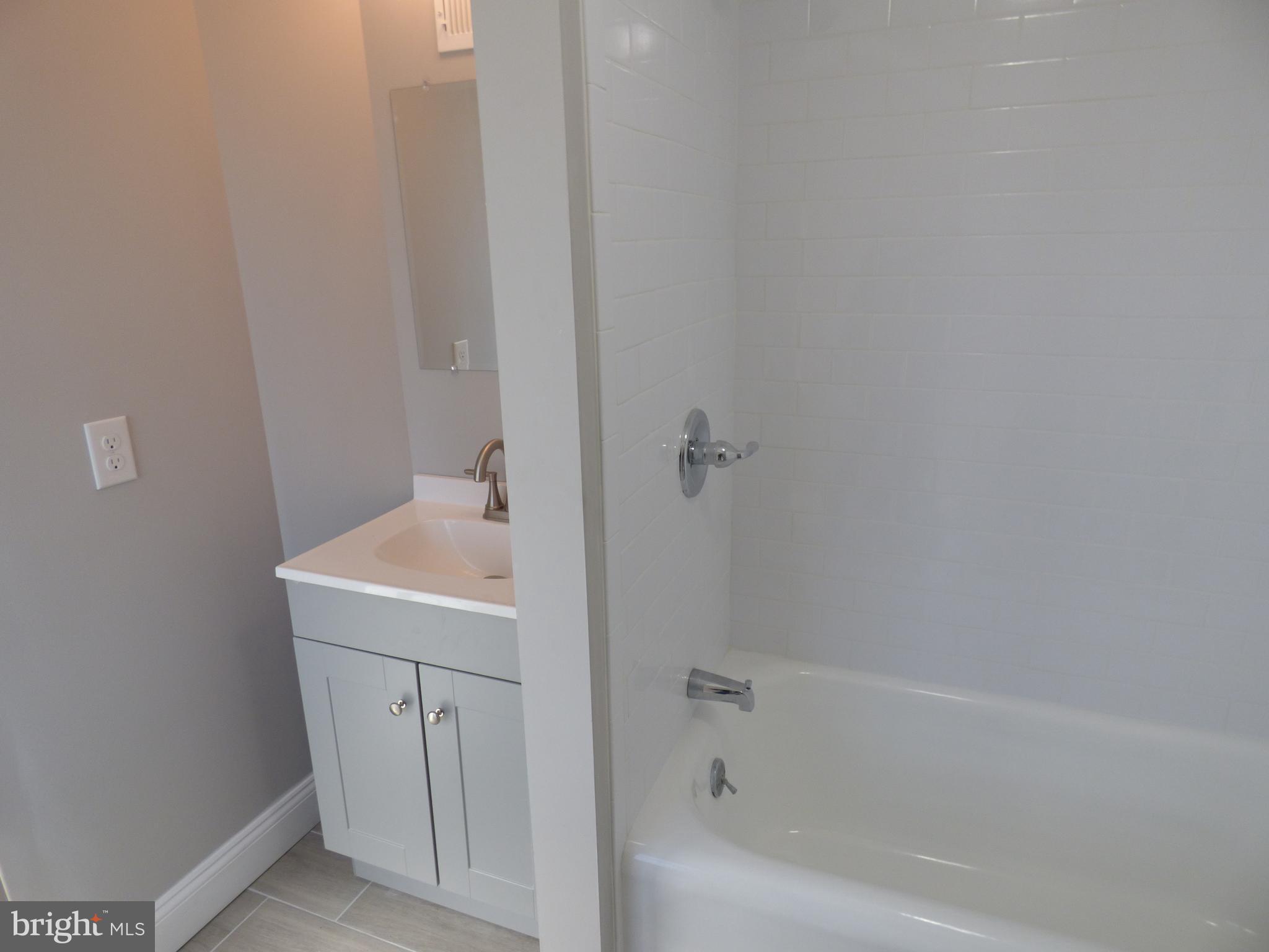 726 Newportville Road Croydon, PA 19021 - Photo 30 of 30 a bathroom with a sink and vanity