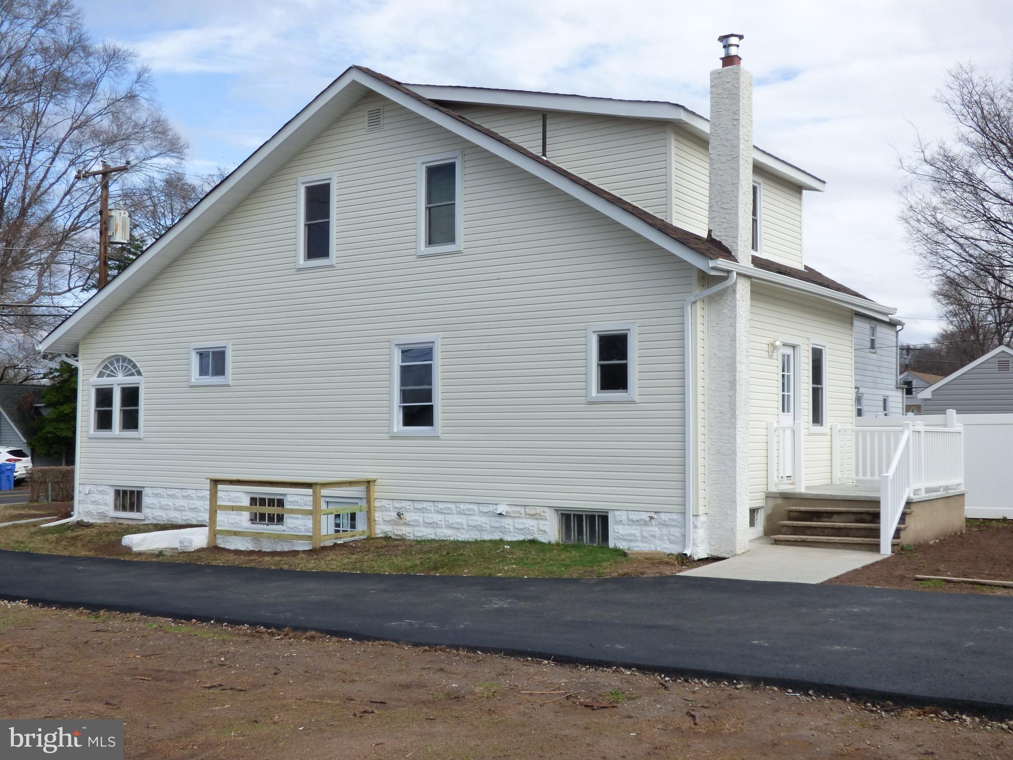 726 Newportville Road Croydon, PA 19021 - Photo 5 of 30 a view of a house with a patio