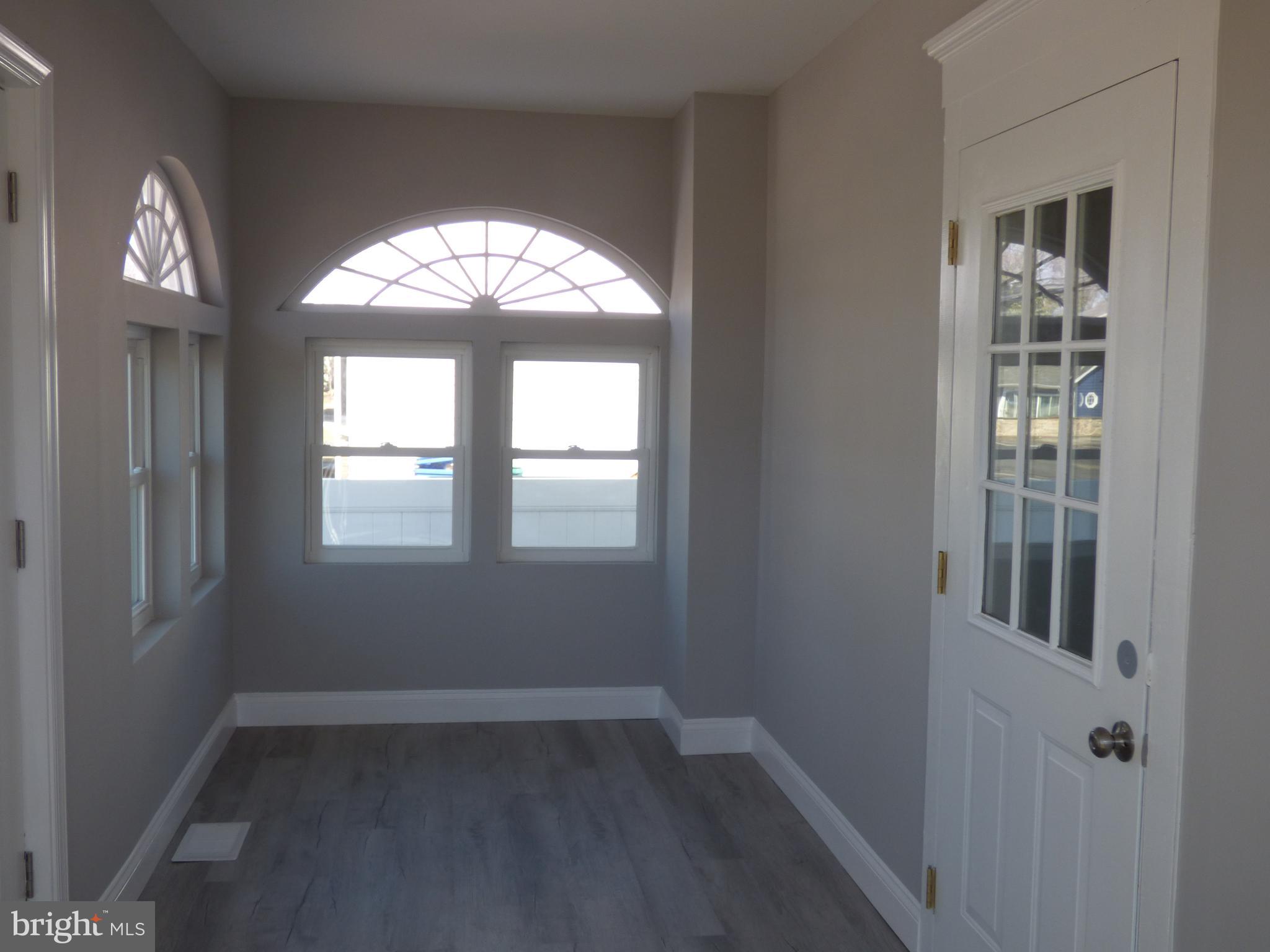 726 Newportville Road Croydon, PA 19021 - Photo 9 of 30 an empty room that has a window