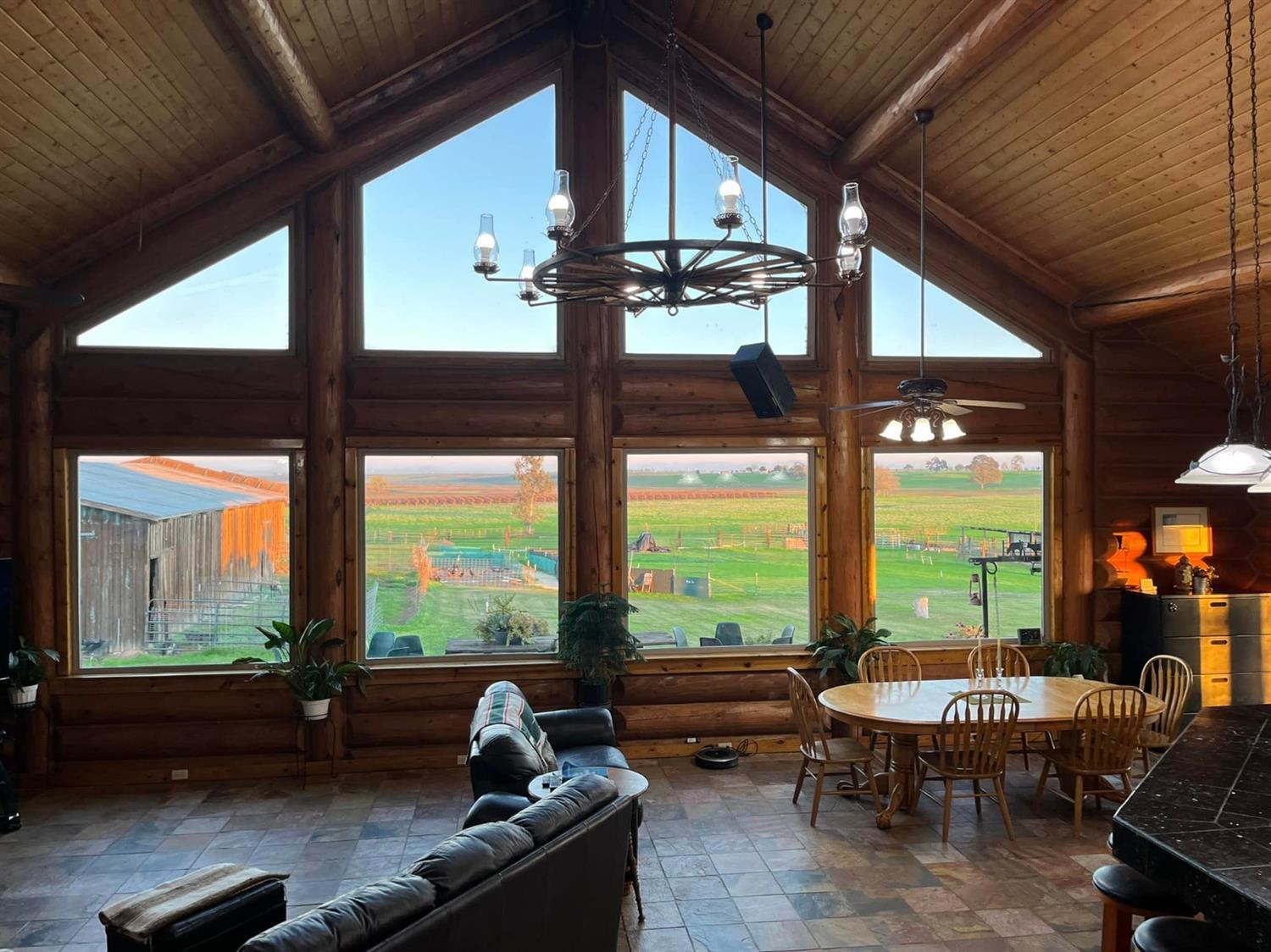 29266 Dry Creek Road Galt, CA 95632 - Photo 15 of 44 a living room with furniture and a large window